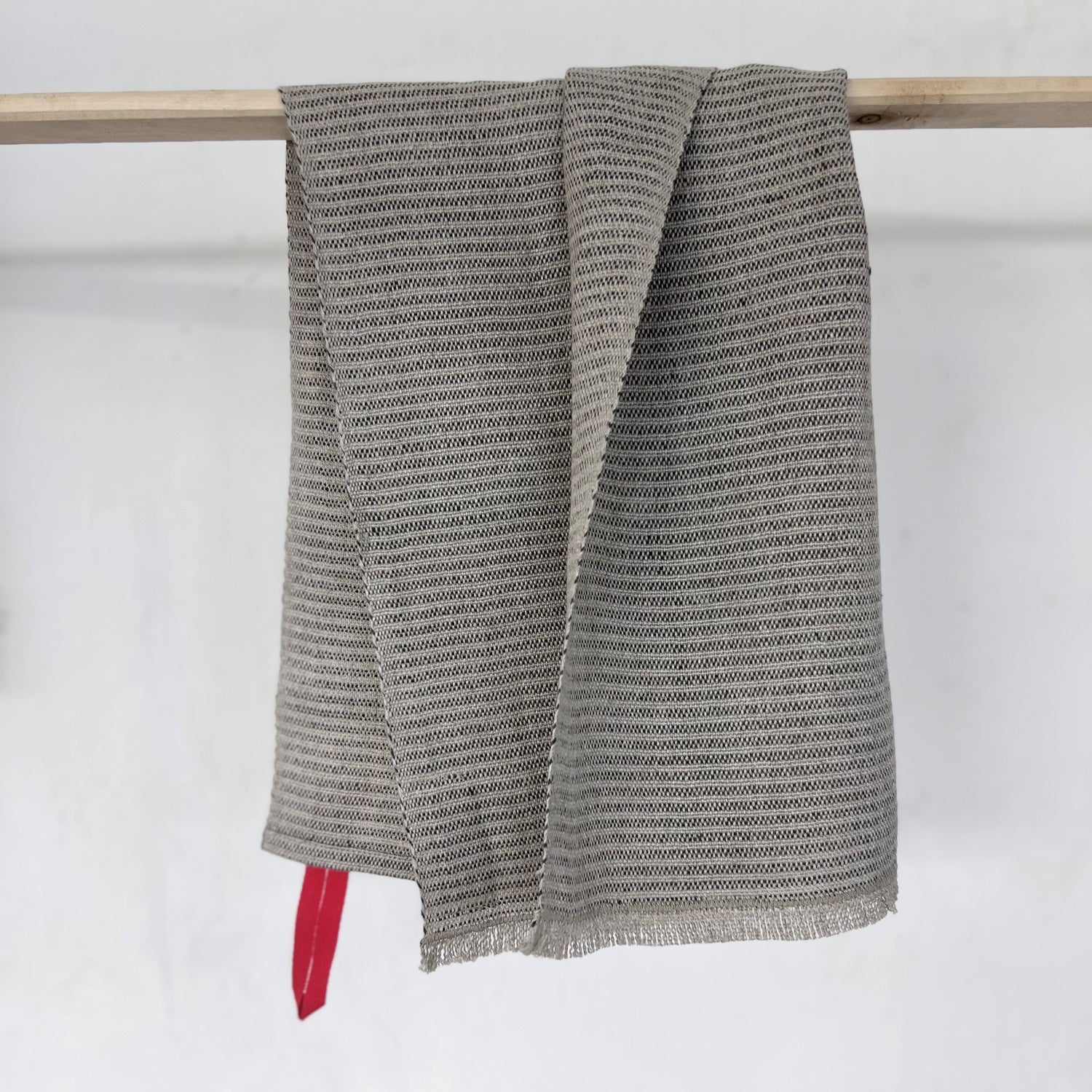 Handwoven linen kitchen towel in natural 40x70 cm with a red hanging loop