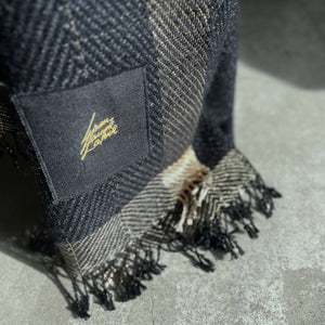 Handwoven linen mohair throw in black and gold with hand-twisted fringes 130x190 cm 