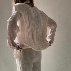 Women's crumpled linen shirt in powder
