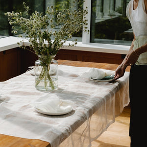 Embroidered linen tablecloth in white 180x125 cm