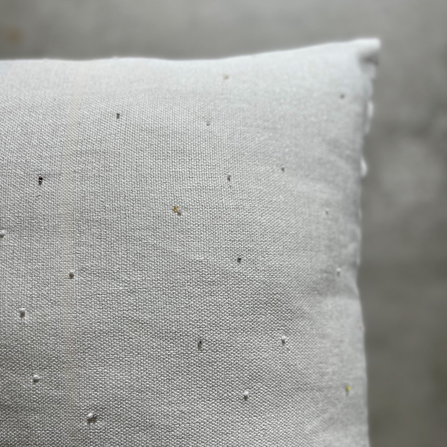 Handcrafted linen cushion with beads in white and silver 45x45 cm