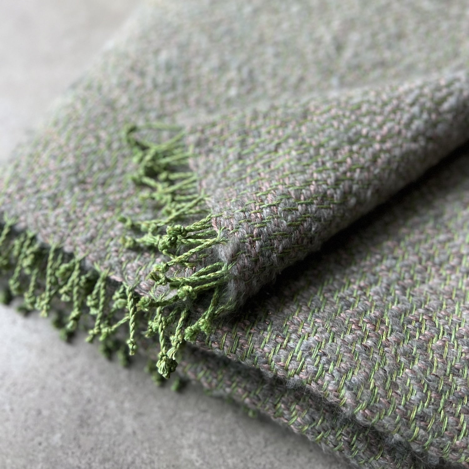 Handwoven linen mohair throw in green and gray with hand-twisted fringes 135x190 cm