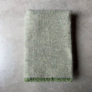 Handwoven linen mohair throw in green and gray with hand-twisted fringes 135x190 cm