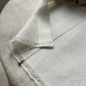 Handwoven Linen Placemat Ieva in white with embroidered black middle line and decorative ends 50x40 cm