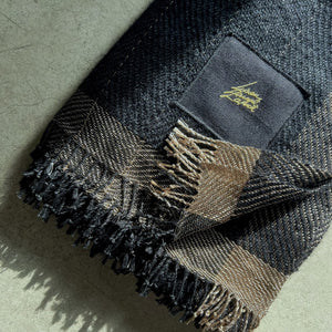 Handwoven linen mohair throw in black and gold with hand-twisted fringes 130x190 cm 