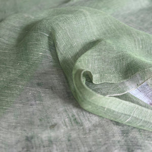 Handwoven sheer linen tablecloth Tinita in green 180x180 cm