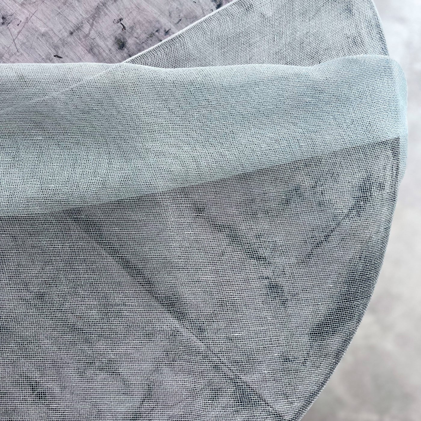 Translucent handwoven linen tablecloth in light blue color 140x200 cm