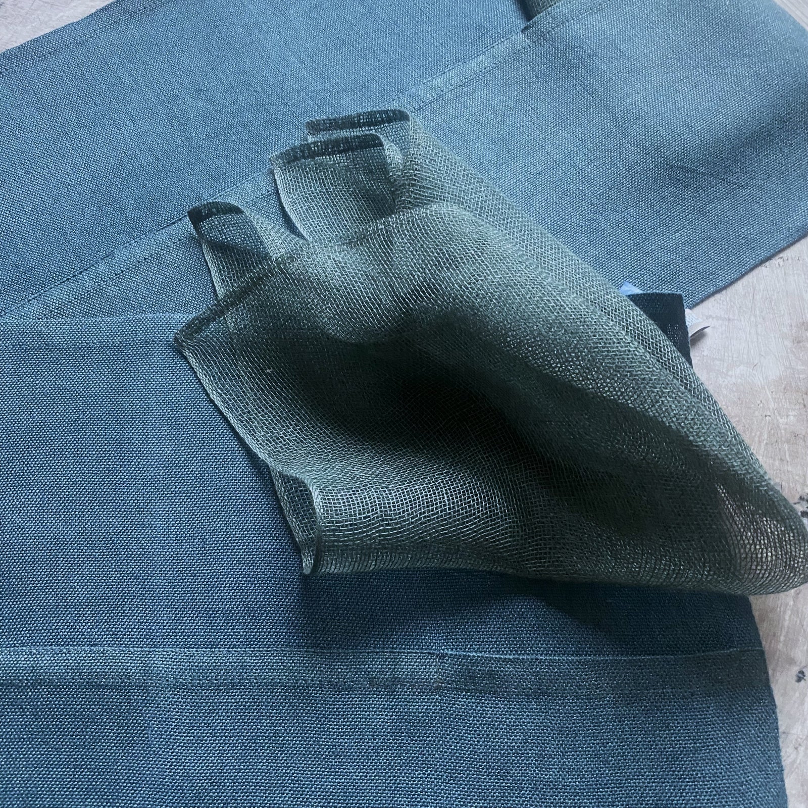 A two-piece bluish Linen Placemat set 50x37 cm