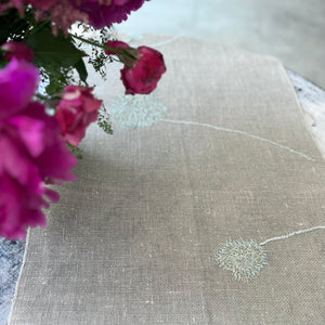Linen table runner in natural with embroidered 5 blue dandelions 50x150 cm