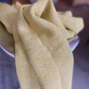 Boucle linen throw in creamy yellow 140x105 cm