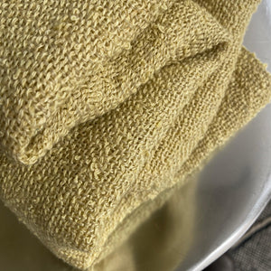 Boucle linen throw in creamy yellow 140x105 cm