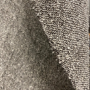 Handmade bouclé linen throw featuring looped linen thread texture in natural linen