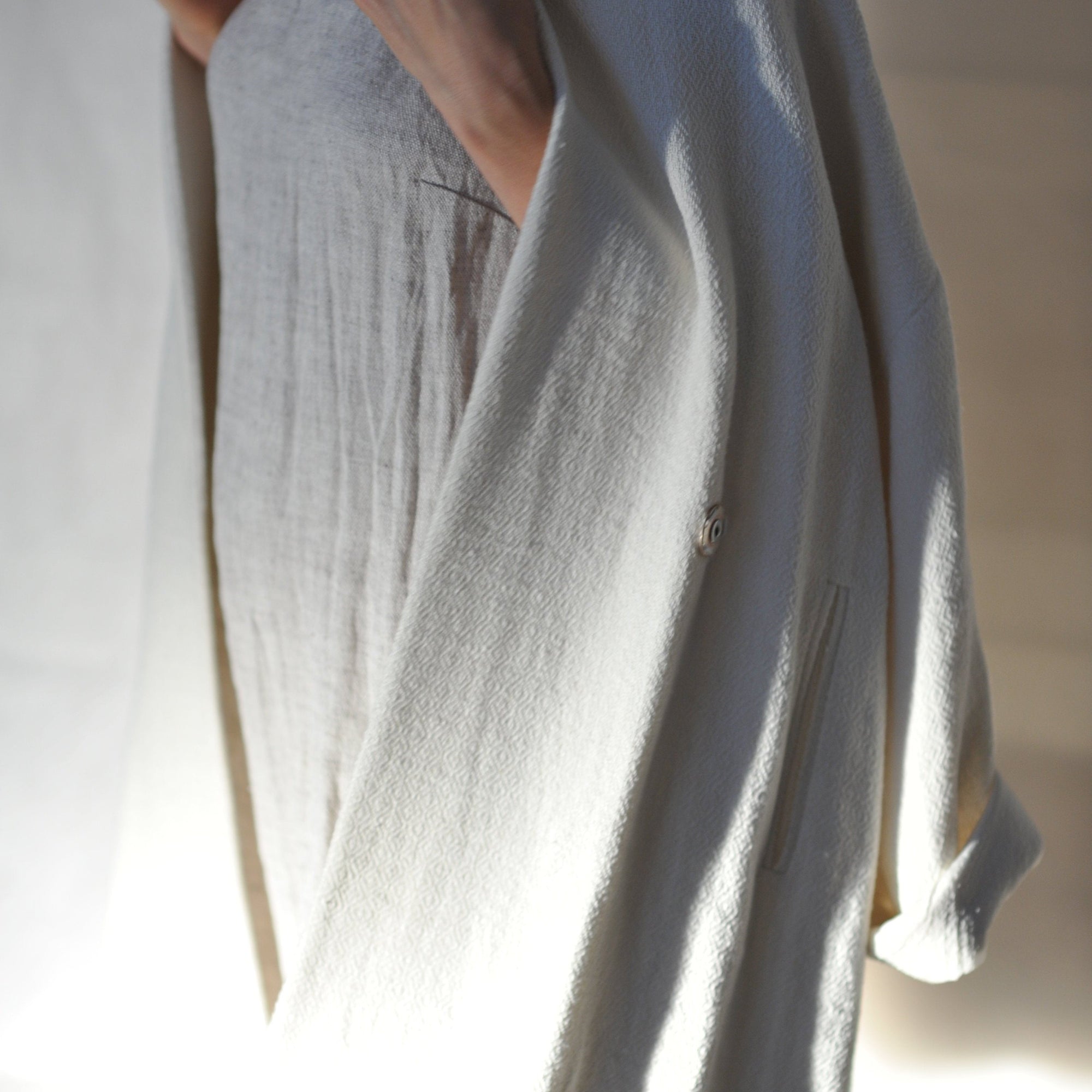 Hand woven Jacquard linen coat with silk lining in white