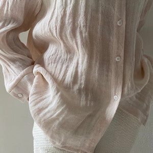 Women's crumpled linen shirt in powder