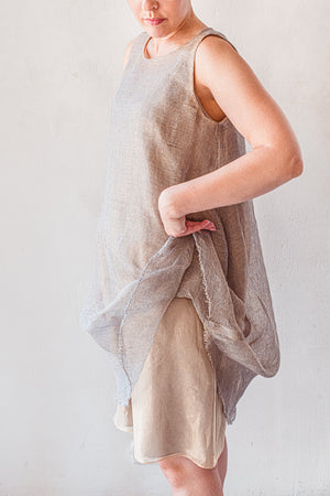Hand woven sleeveless linen dress with silk lining in grey