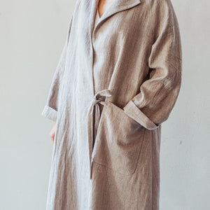 Hand woven linen coat in cool beige.
