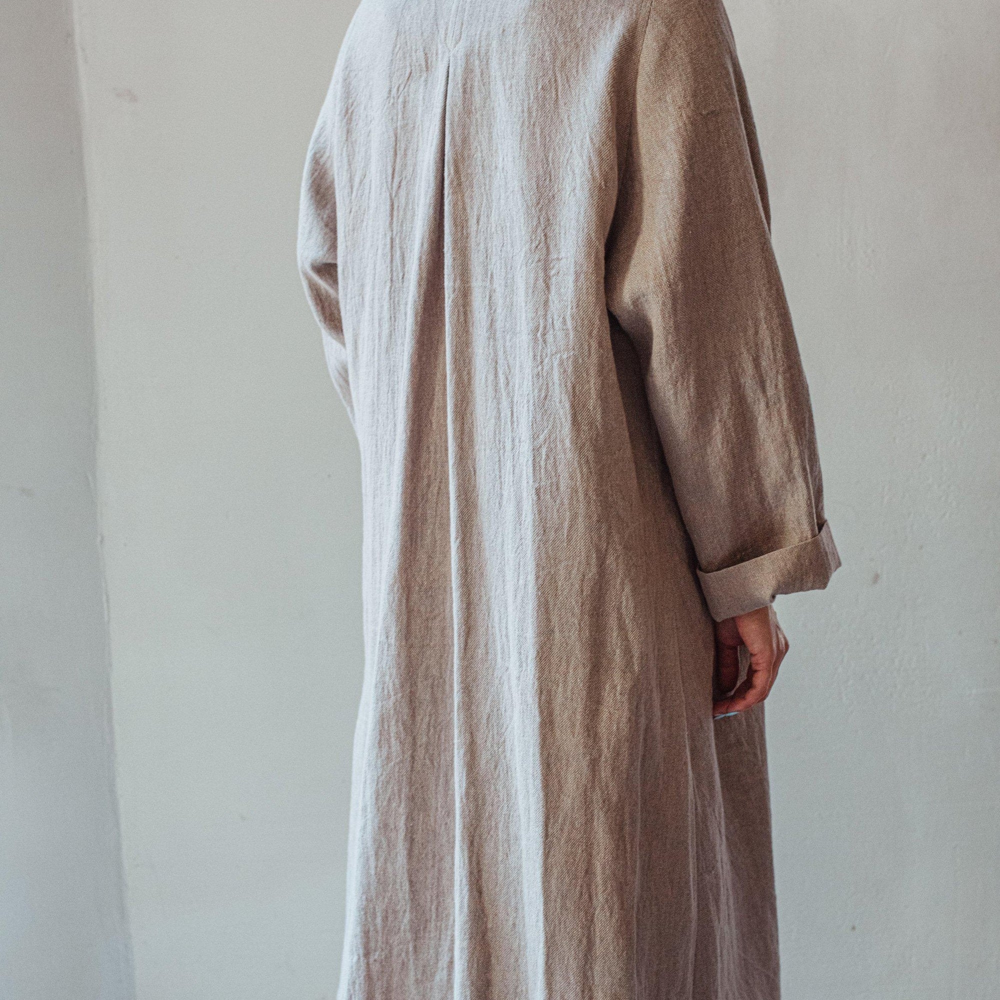 Hand woven linen coat in cool beige.