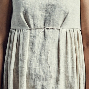 Sleeveless hand woven linen dress in powder