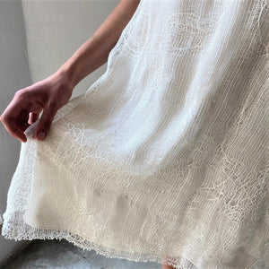 Embroidered linen dress in ivory white